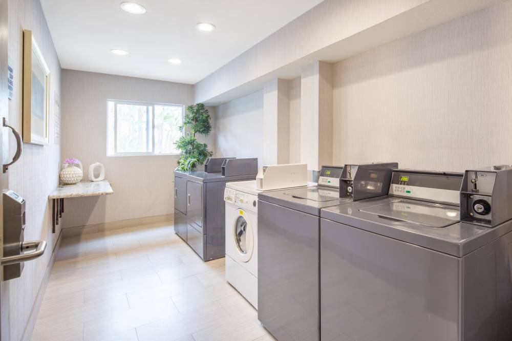Coin operated laundry room on site. 