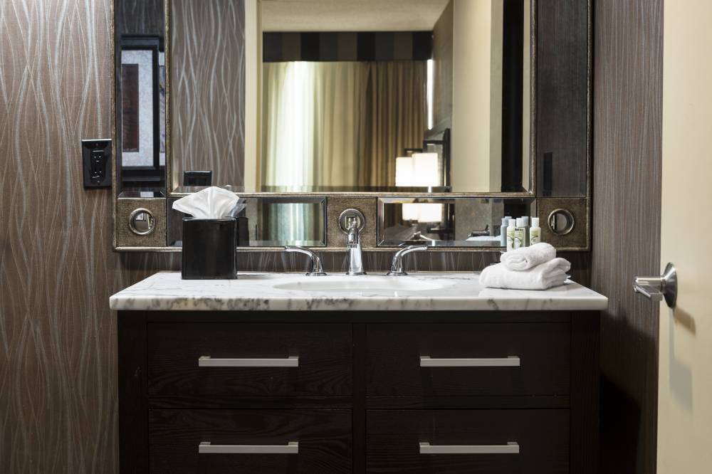 Relax in our guest bathroom with modern marble fin