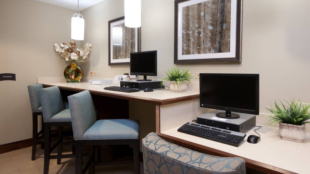 Business center with computer and printer availabl
