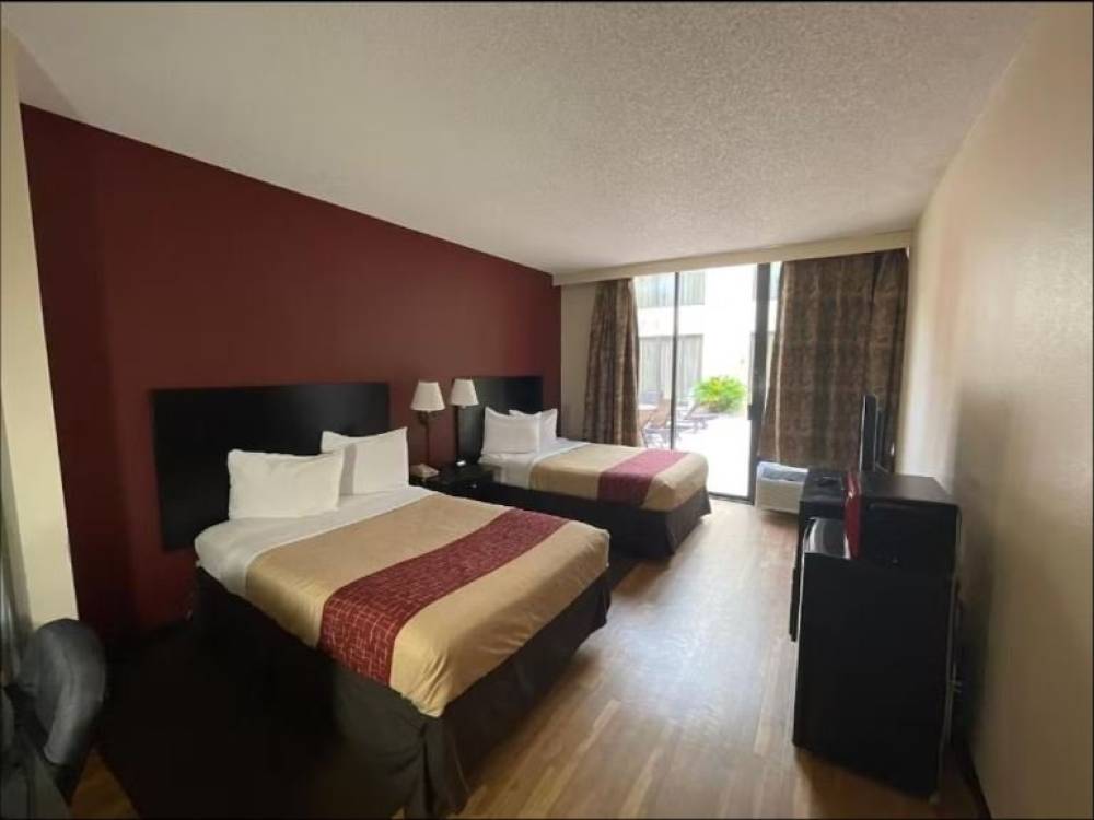 Two Double Beds Poolside